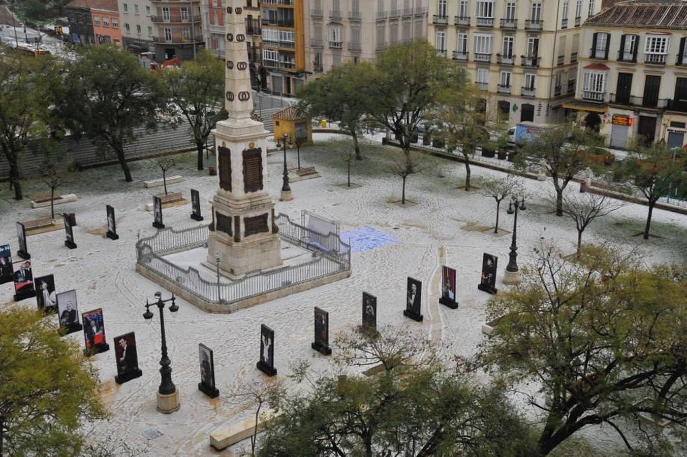 En imágenes, una intensa granizada cae sobre las calles de Málaga