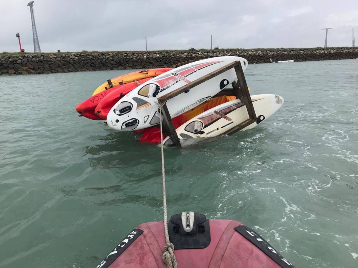 FOTOS: Instalaciones y veleros destrozados en Elcano por la tromba marina de Cádiz