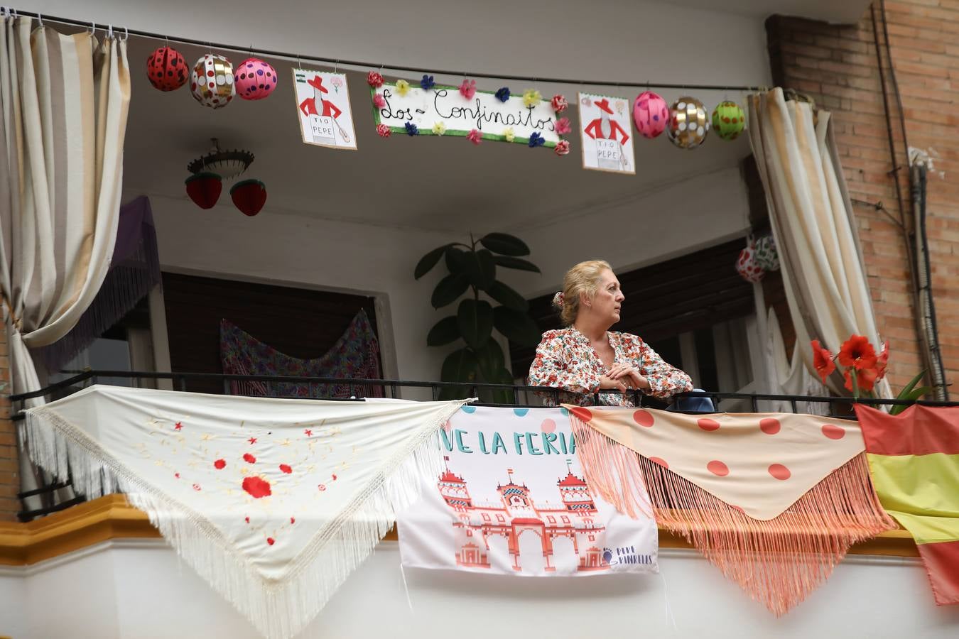 Efectos del coronavirus en Sevilla: la Feria de Abril en los balcones