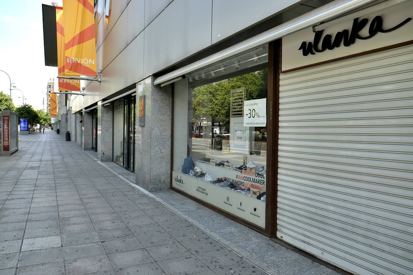 Desolación en las calles comerciales de Sevilla a la espera de la vuelta de actividad