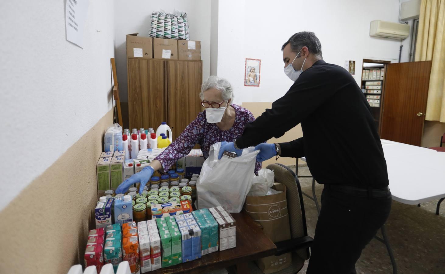 La ayuda a las familias desde las parroquias de Córdoba, en imágenes