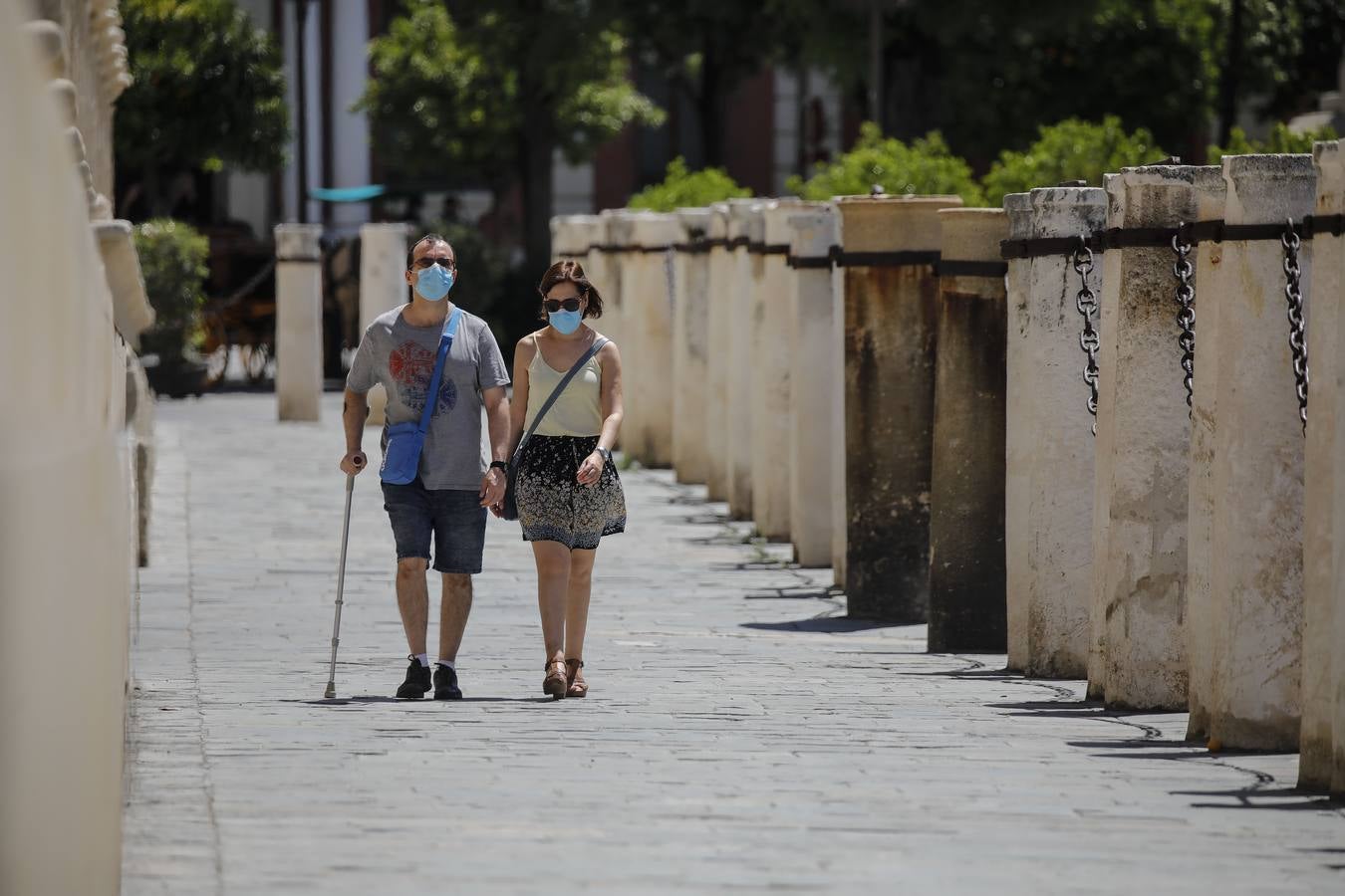 En imágenes, el calor marca la llegada de la «nueva normalidad» en Sevilla