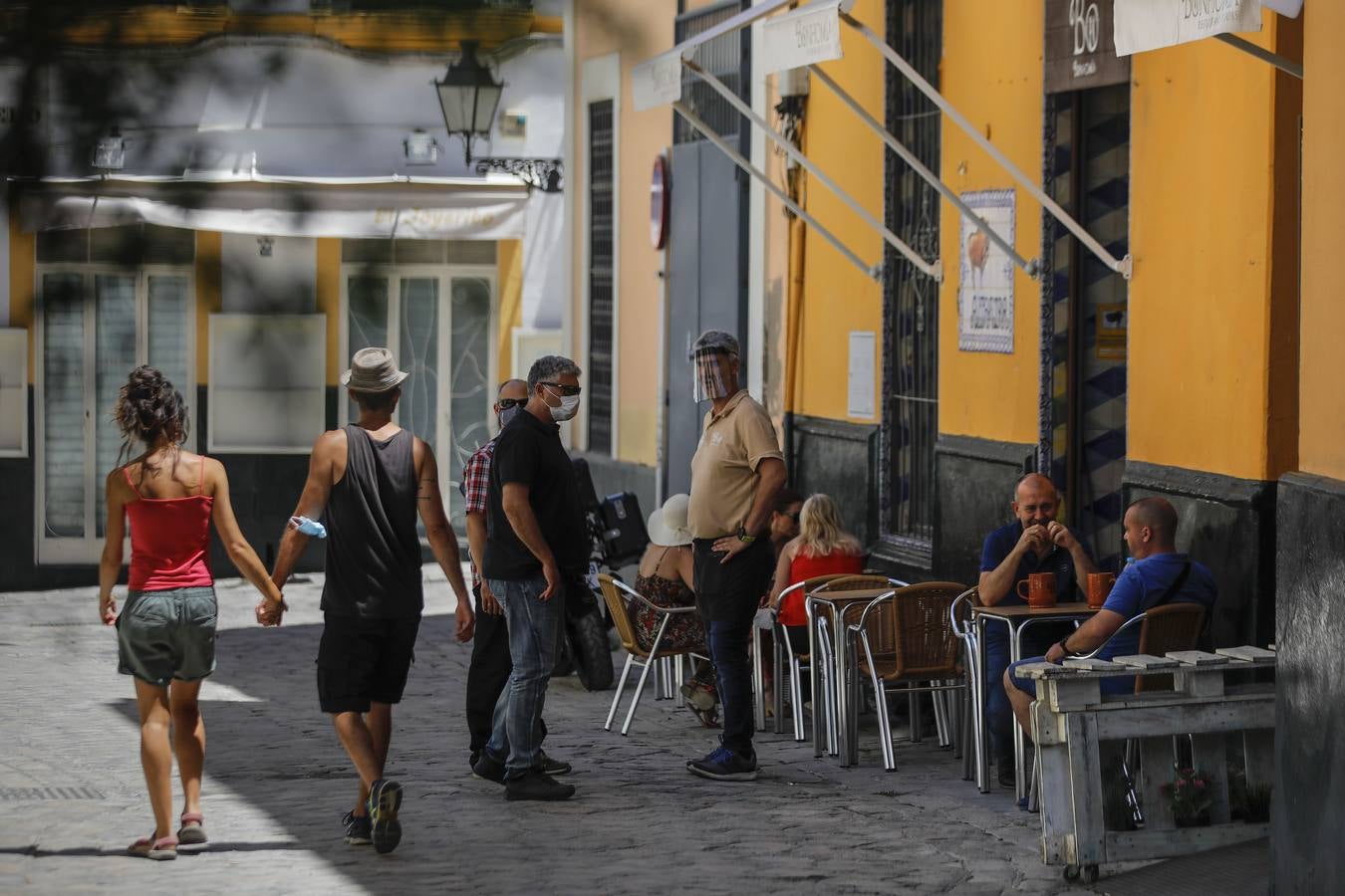 En imágenes, el calor marca la llegada de la «nueva normalidad» en Sevilla