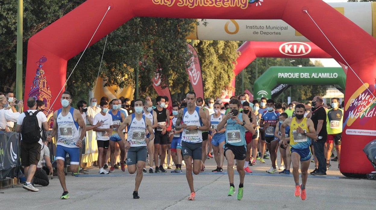 La carrera popular &#039;Nocturna del Alamillo&#039;, en imágenes