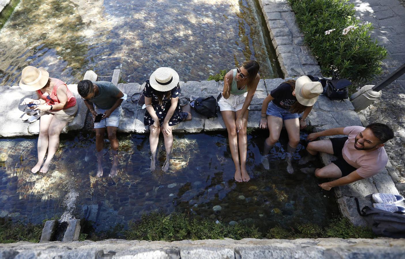 El calor de julio en Córdoba, en imágenes