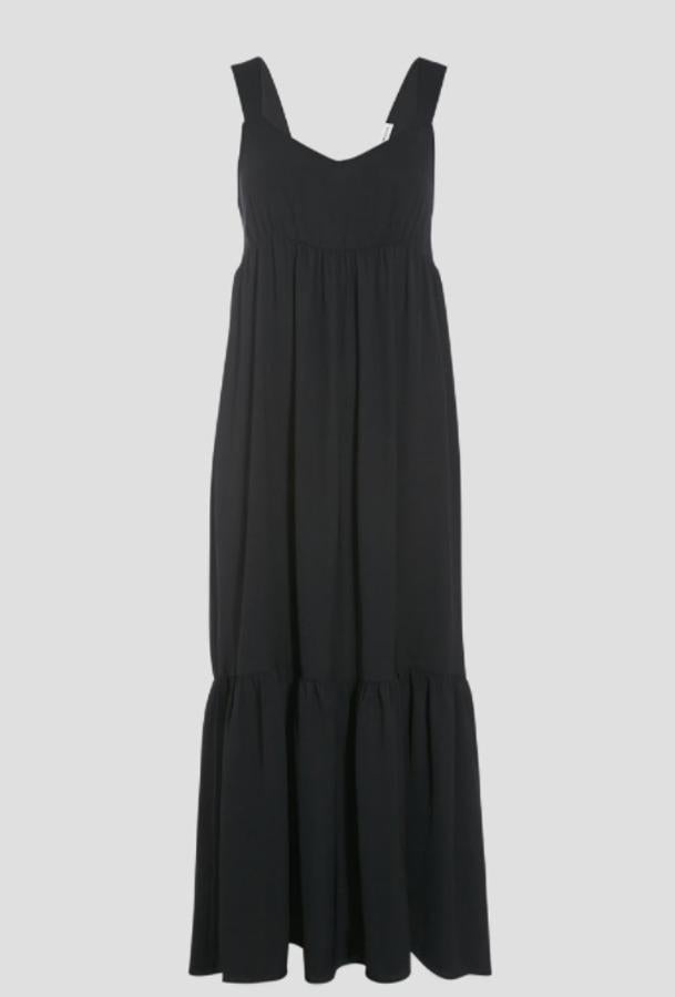 Cache Cache - Vestidos negros para llevar 24/7. Vestido oversize con volantes, de Cache Cache. Cómodo y estiloso a partes iguales gracias a su patrón fluido y a los volantes en la parte inferior. Precio: 39€