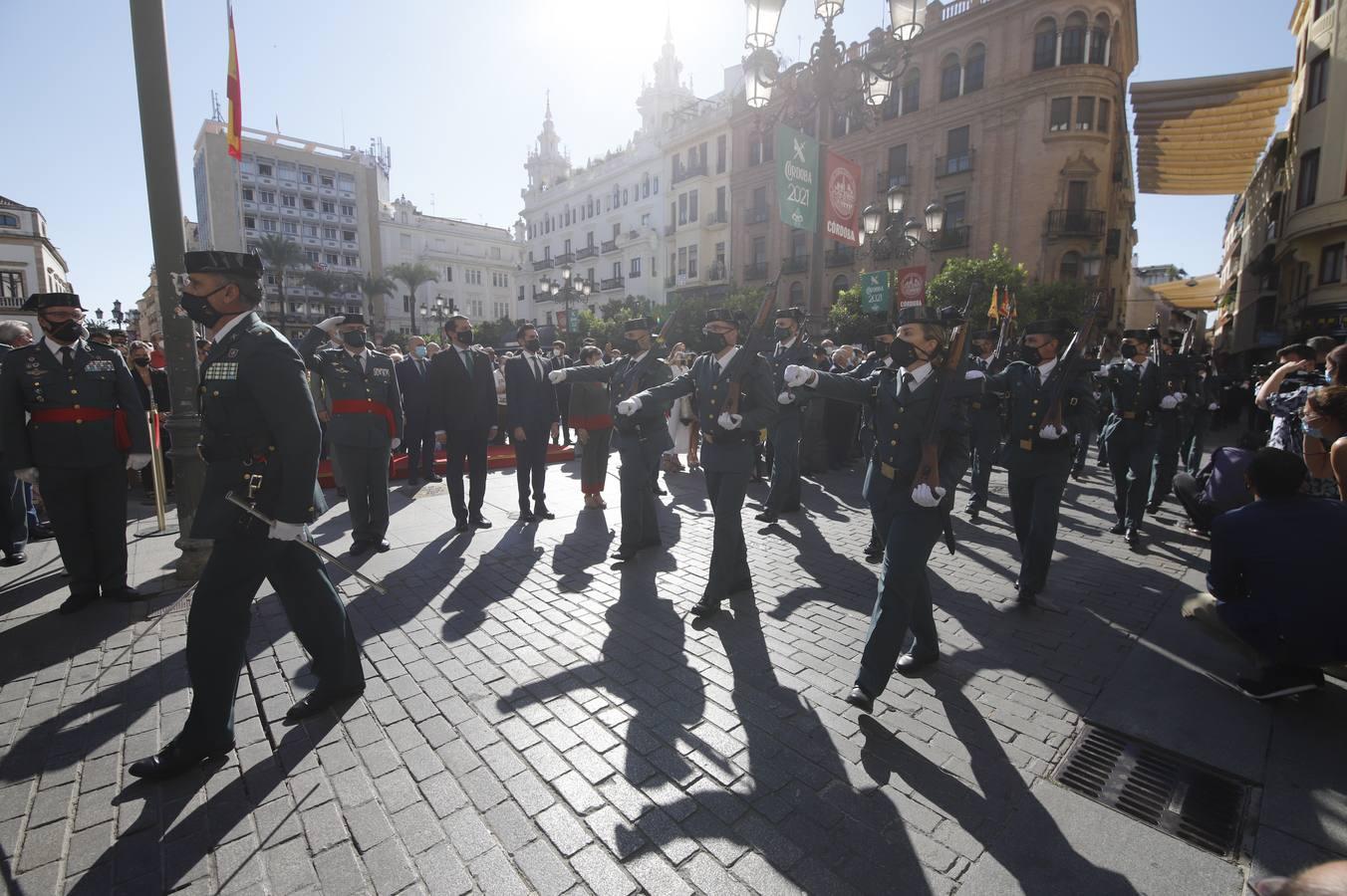 El izado de la bandera de España en los actos de la Guardia Civil por su patrona, en imágenes