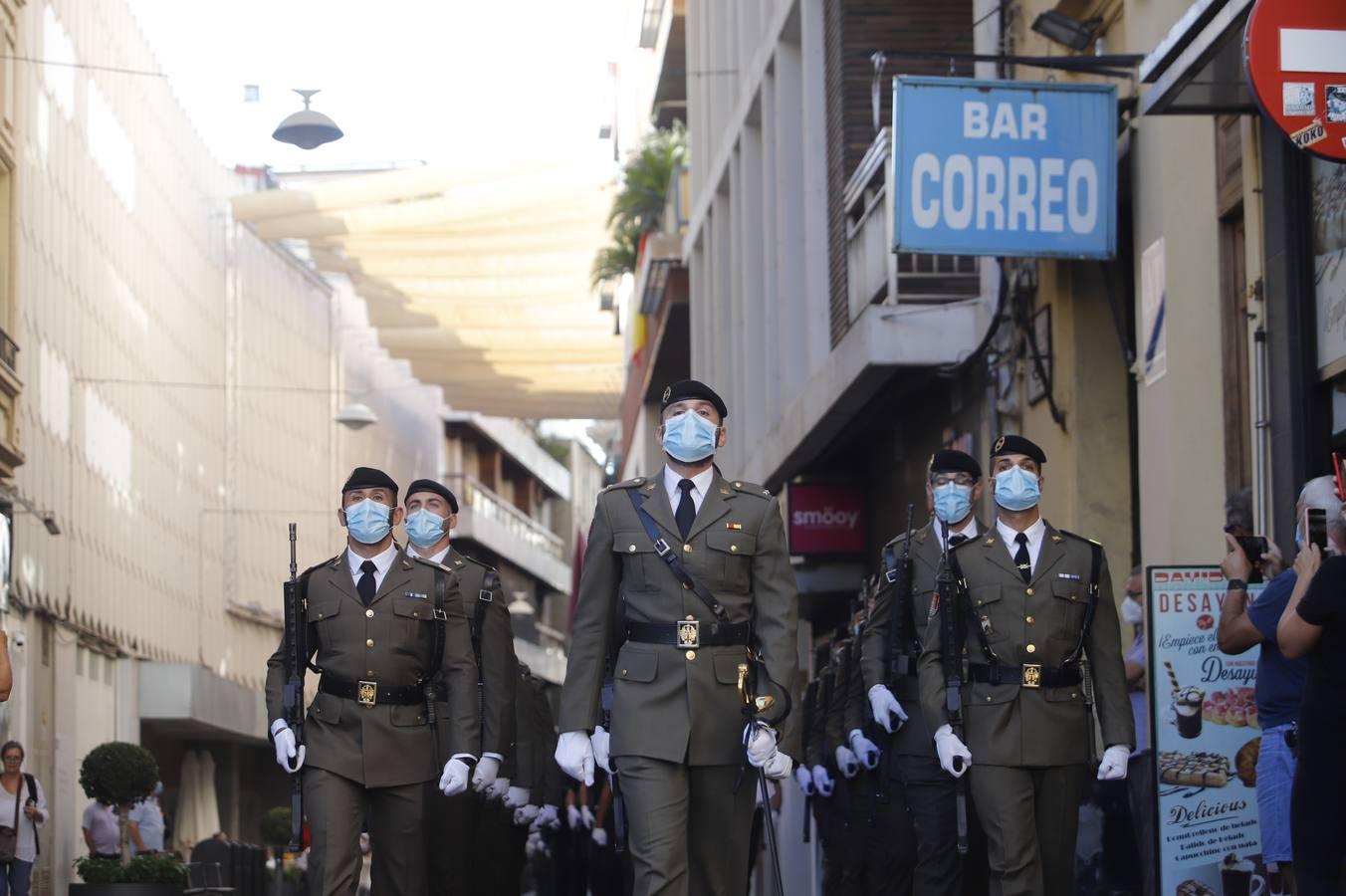 El izado de la bandera de España en los actos de la Guardia Civil por su patrona, en imágenes