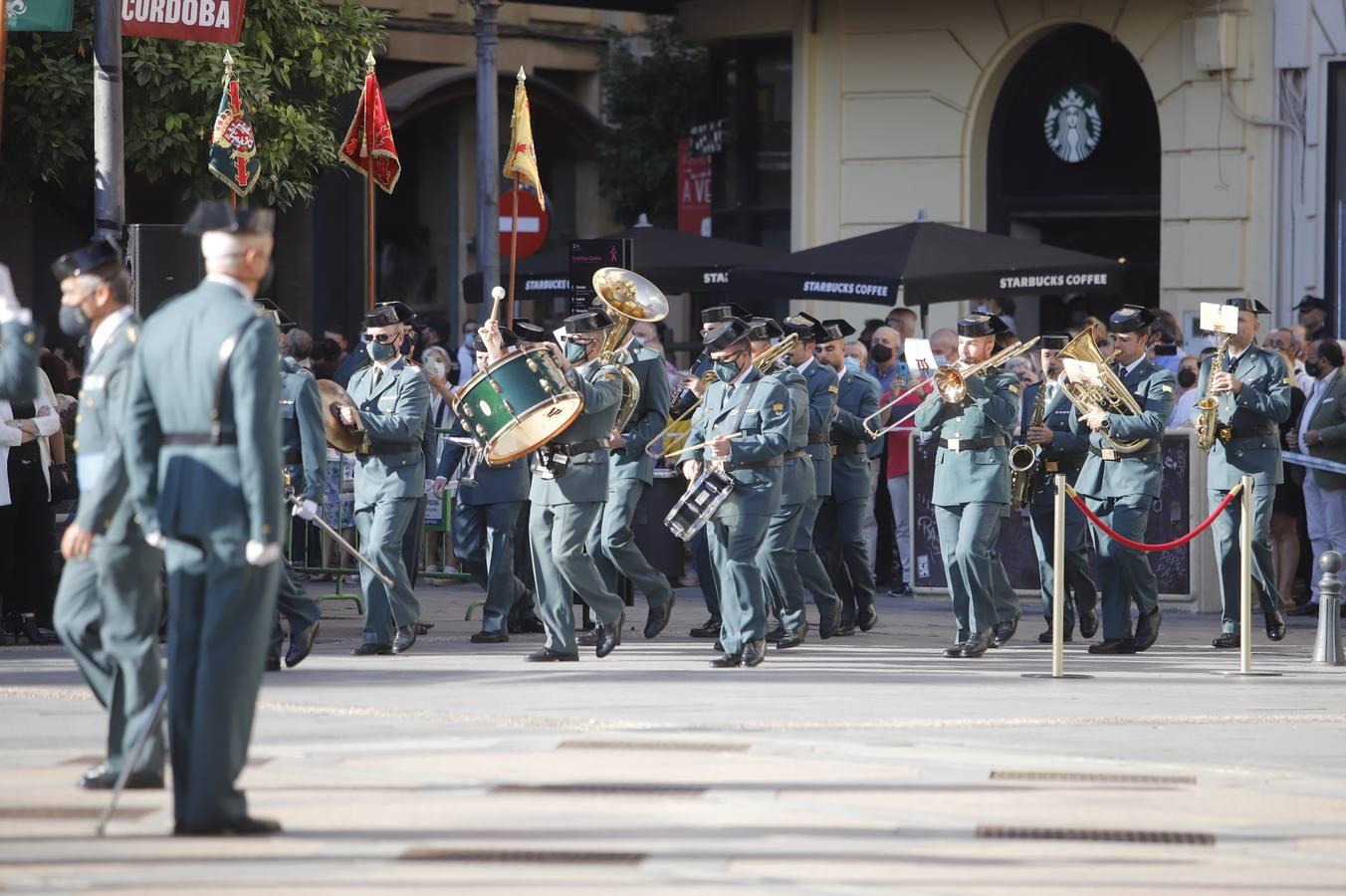 El izado de la bandera de España en los actos de la Guardia Civil por su patrona, en imágenes