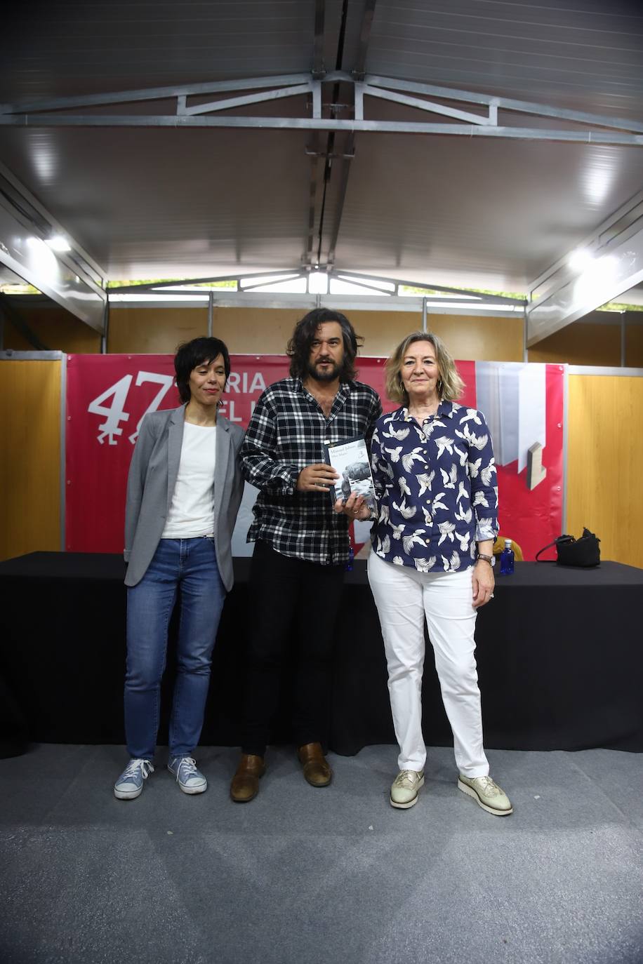 Los libros copan Córdoba: Antonio Pérez Henares y Manuel Jabois, en imágenes