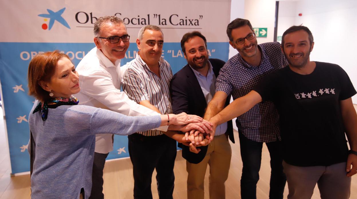 Representantes de las entidades beneficiarias de los programas de La Caixa