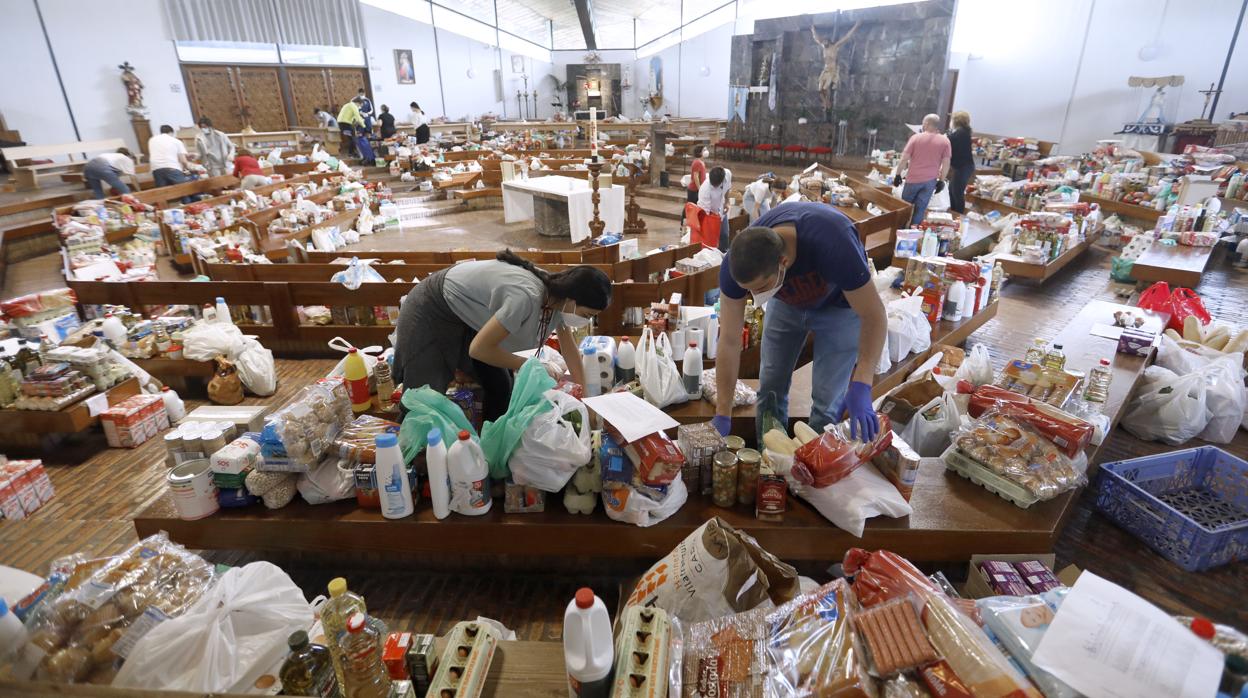 Comida preparada para su reparto en Nuestra Señora de la Asunción, del Parque Figueroa