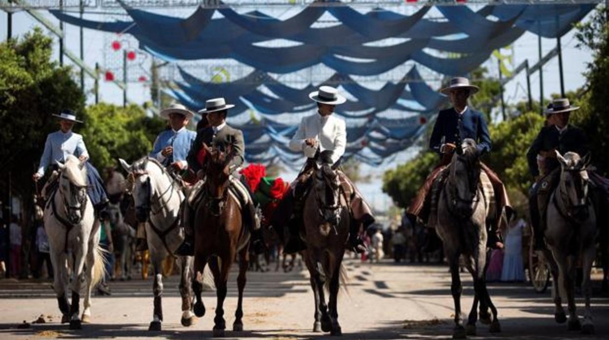 Caballistas en el Real de Cortijo de Torres