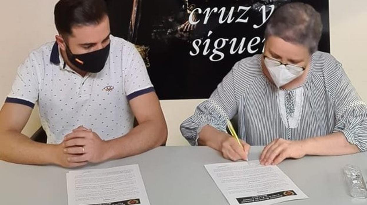 Firma entre la banda Fe y Consuelo y la hermandad de la Vera Cruz