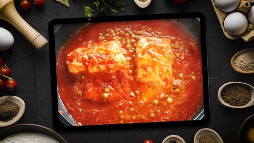 Bacalao con tomate y piquillos.