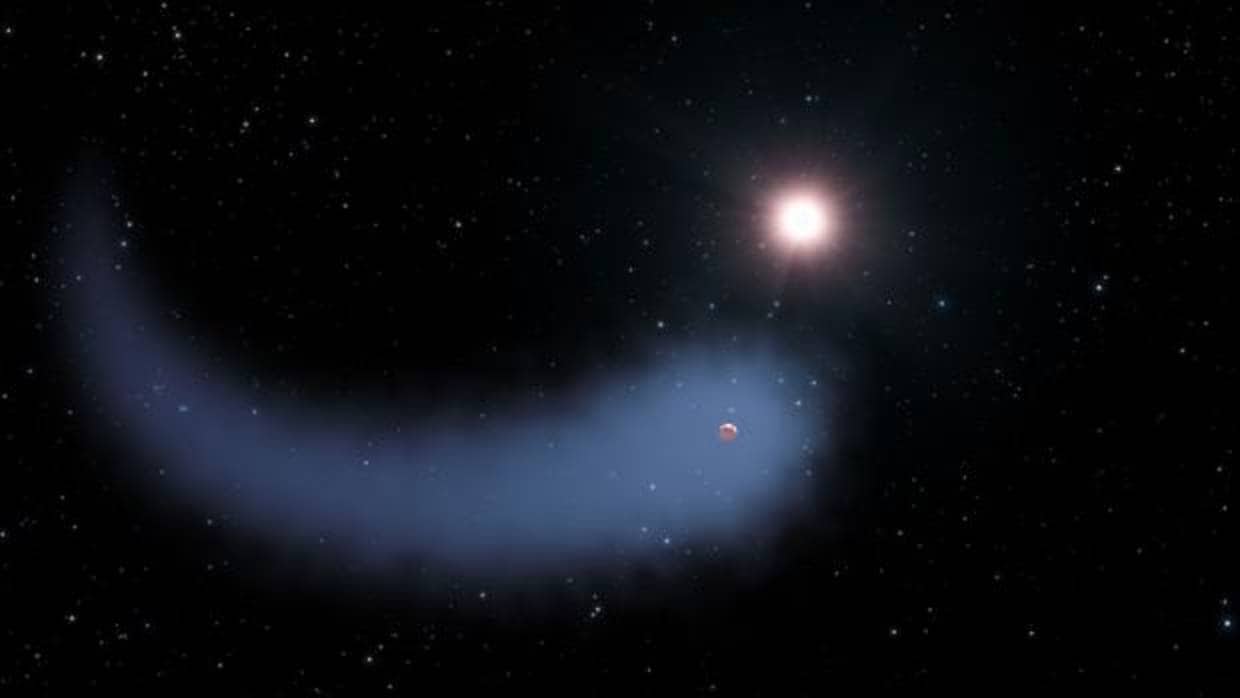 La ilustración muestra el extraño aspecto de GJ 436b, con una enorme cola que recuerda a la de un cometa