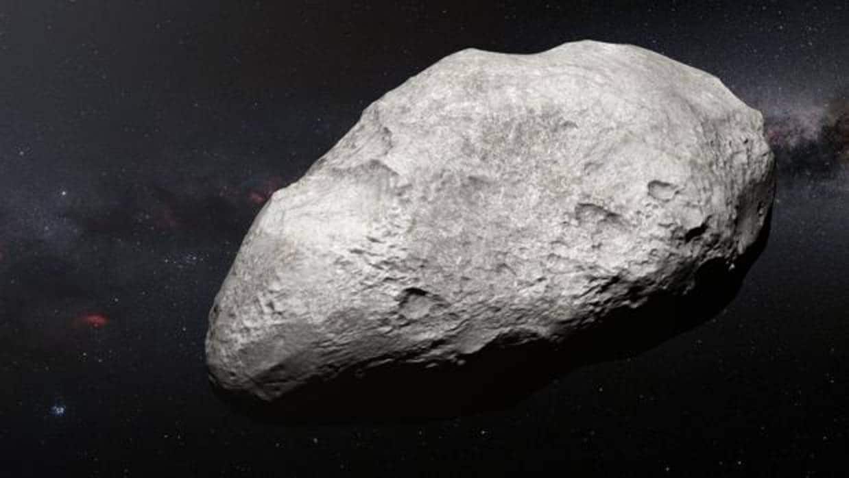 Representación de «2004 EW95». Está compuesto por carbono y roca, a diferencia de los otros cuerpos conocidos del cinturón de Kuiper, el lugar donde se ha hallado