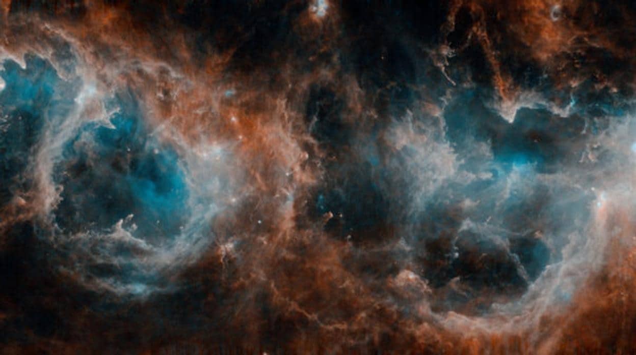 Imagen infrarroja de Herschel de un complejo de nubes moleculares, nubes interestelares en las que se forman moléculas