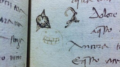 Una cara dibujada sobre un manustrito del siglo XV