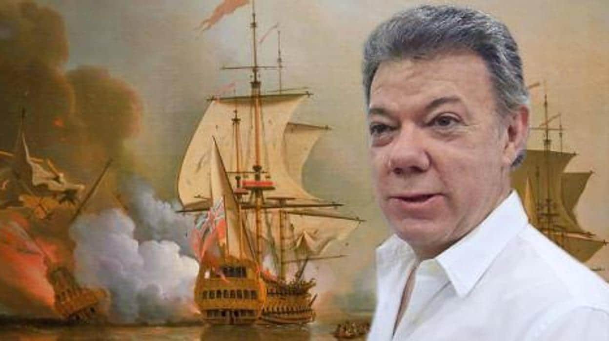 El presidente colombiano, Juan Manuel Santos, junto al galeón de San José