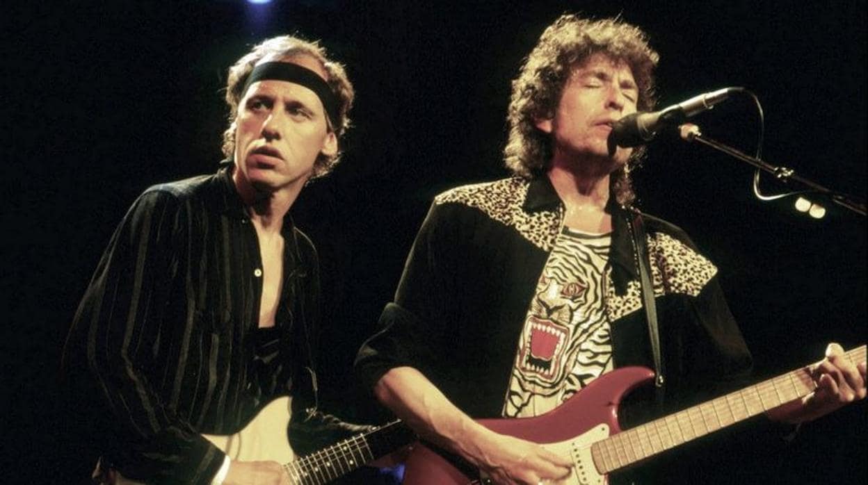 Mark Knopfler y Bob Dylan en un concierto juntos en 1986