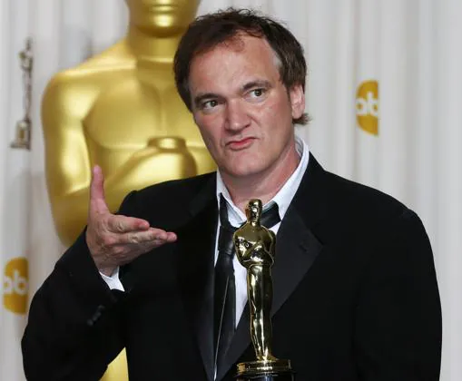 Tarantino, con el Oscar al Mejor Guión por «Django desencadenado», en 2013