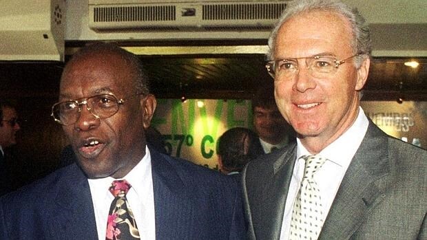 Beckenbauer, junto a Warner