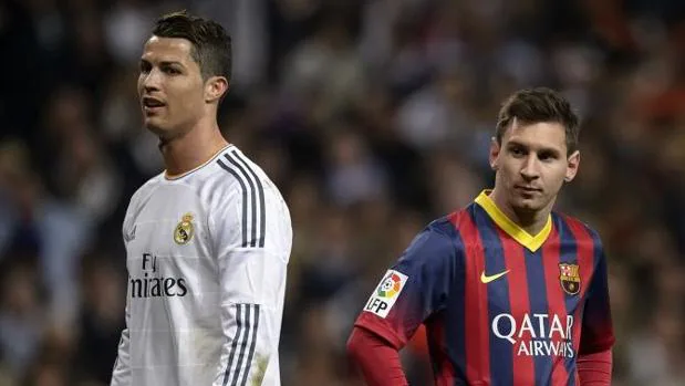 Cristiano Ronaldo y Messi, en un Clásico de la temporada 2013-2014