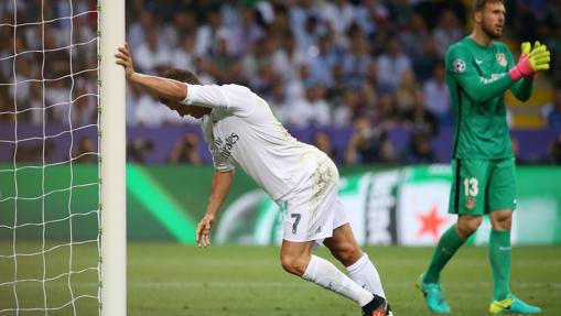 Cristiano y Oblak en la final de Milán