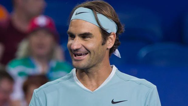 Federer sonríe durante el partido