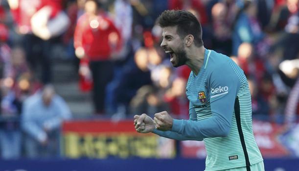 Gerard Piqué celebra el gol de Messi en el Calderón este pasado fin de semana