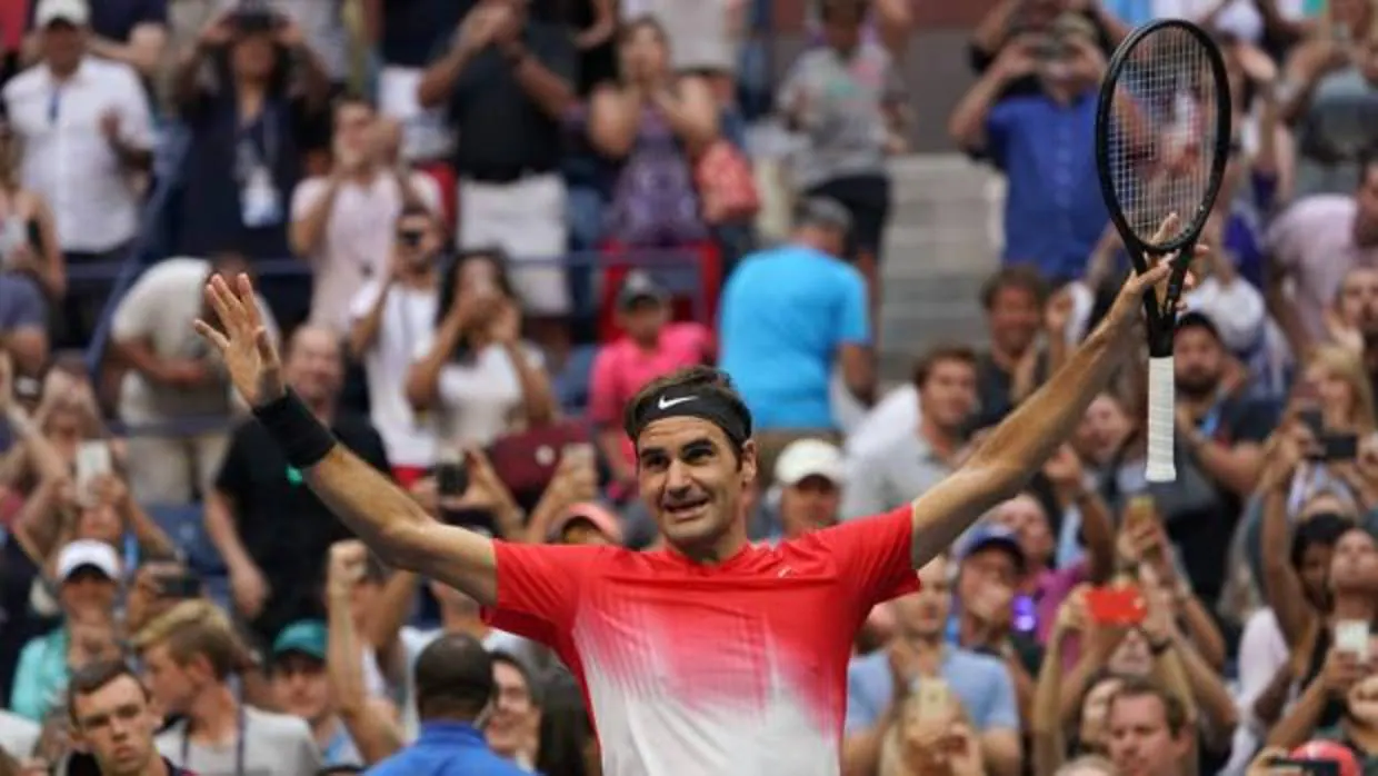 El tenista suizo Roger Federer celebra su victoria ante el ruso Youzhny en el US Open