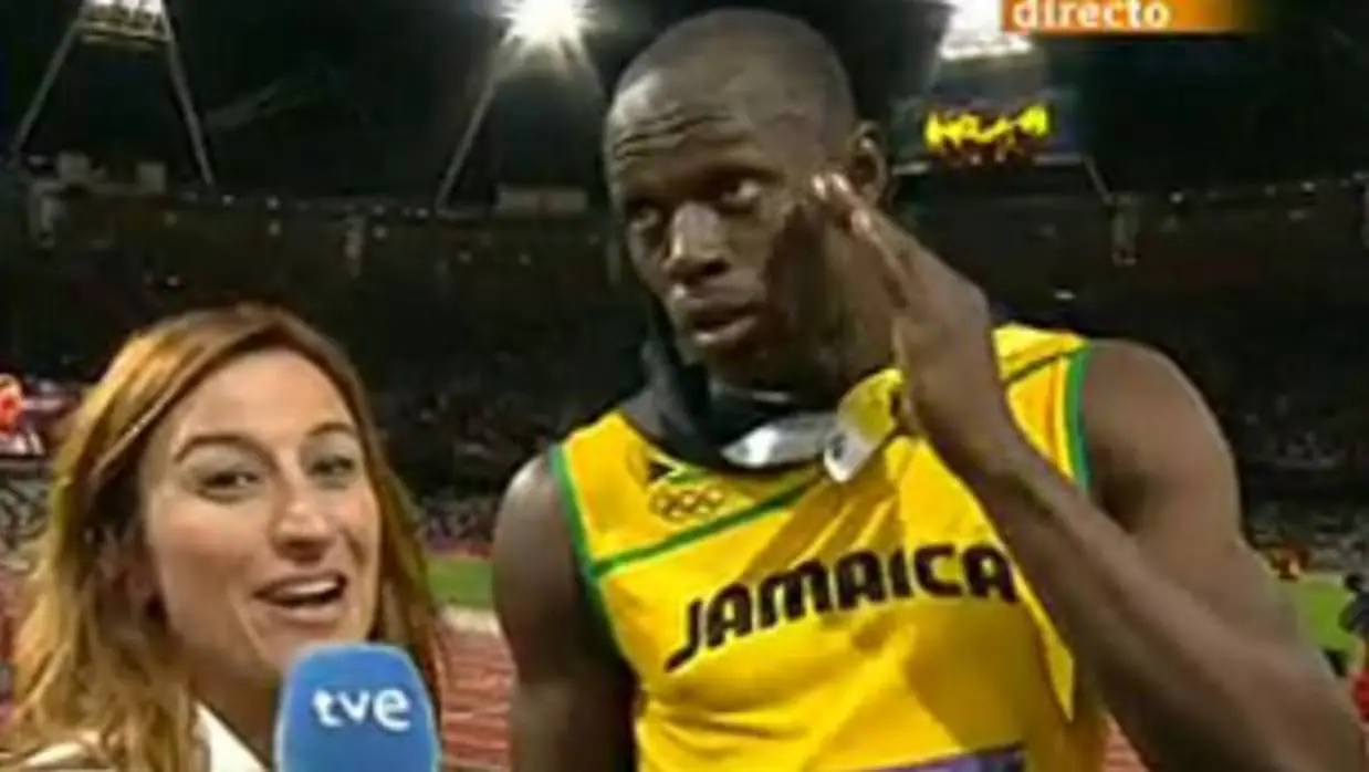 Usain Bolt con la periodista de TVE