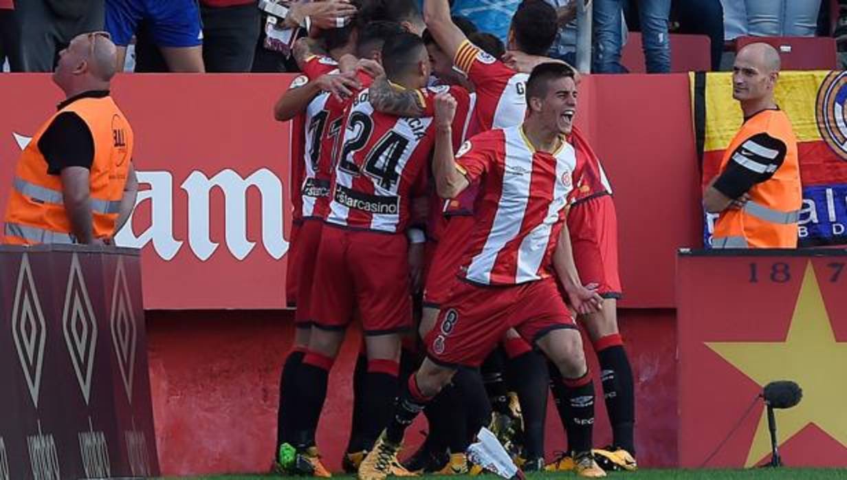 Los jugadores del Gerona celebran el gol del triunfo ante el Madrid