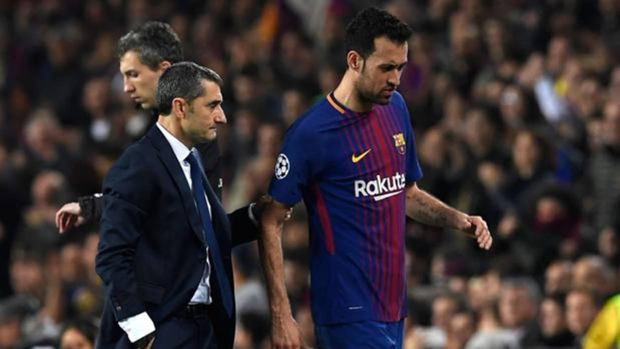 Valverde y Busquets durante el partido ante el Chelsea