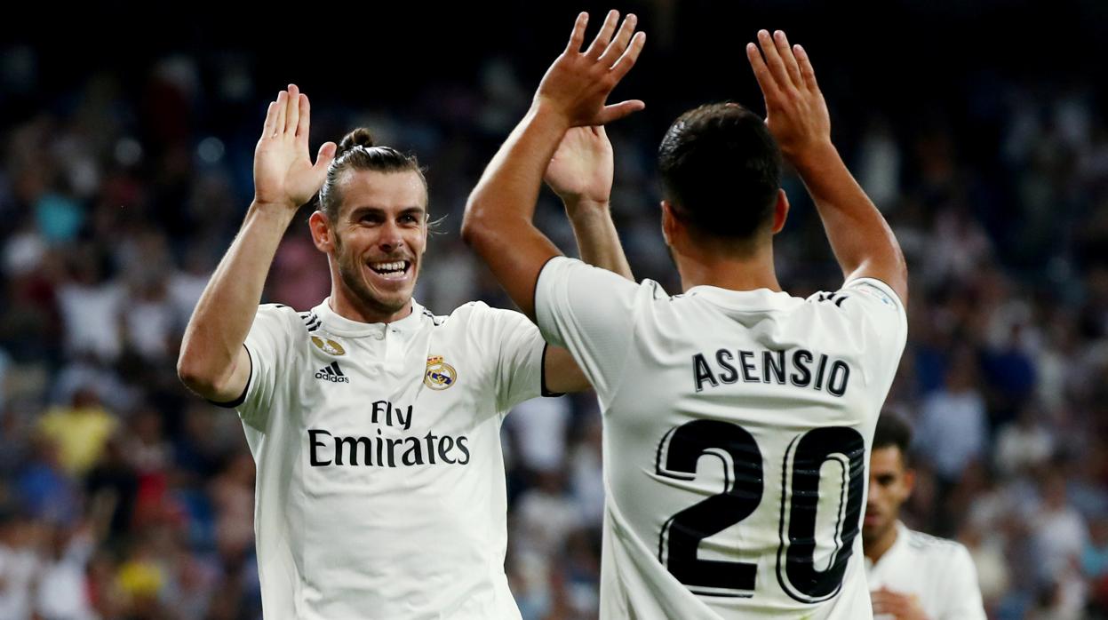 Bale y Asensio celebran un gol en el partido contra el Getafe