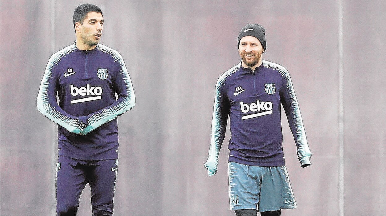 Luis Suárez y Leo Messi durante un entrenamiento