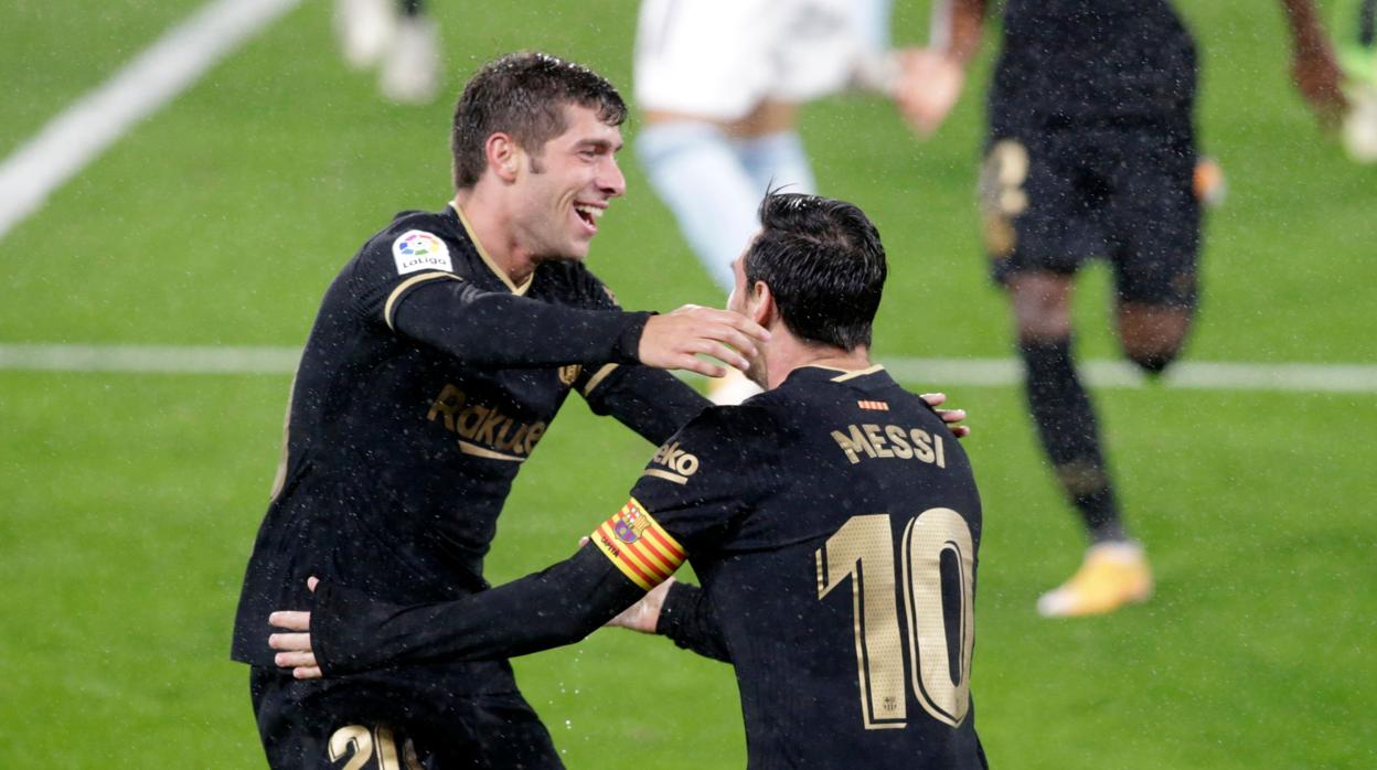 Sergi Roberto y Messi celebran el tercer gol del Barcelona