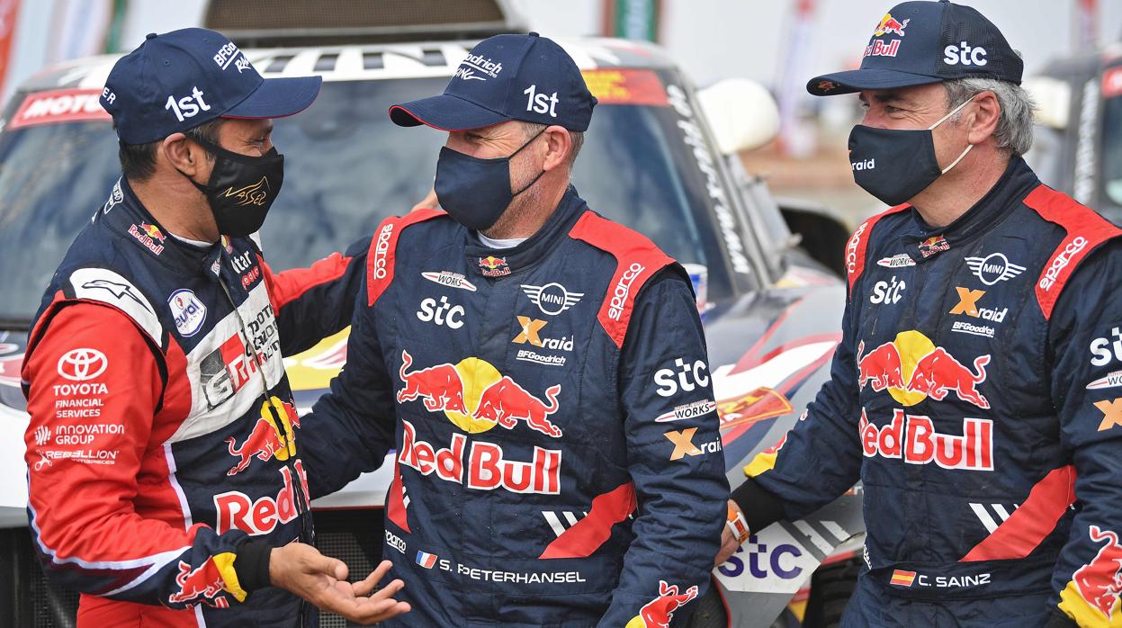 Sainz, con Al-Attiyah y Peterhansel