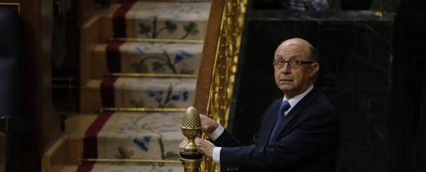 El ministro de Hacienda, Cristóbal Montoro, esta mañana en el Congreso de los Diputados