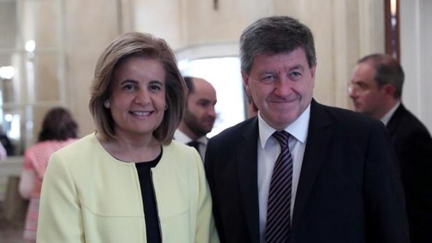 El director general de la OIT, Guy Ryder, junto a la ministra de Empleo y Seguridad Social, Fátima Báñez