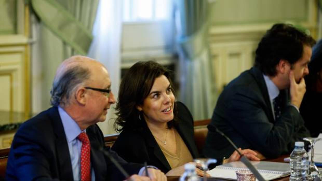 Cristóbal Montoro y Soraya Sáenz de Santamaría