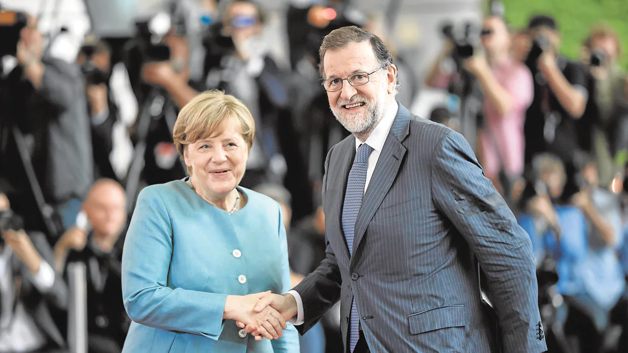 Merkel y Rajoy en junio en Berlín durante una cumbre del G-20 