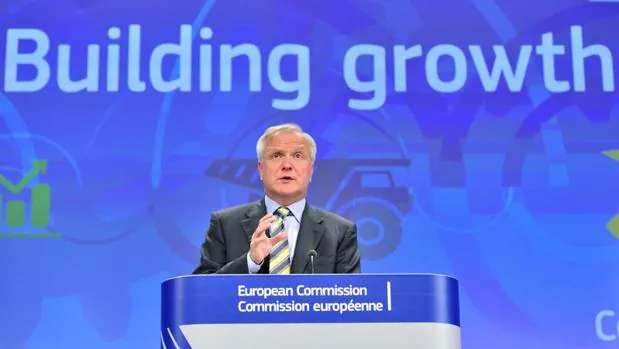 Olli Rehn considera que el rescate bancario fue «crucial» para recuperar la confianza en España