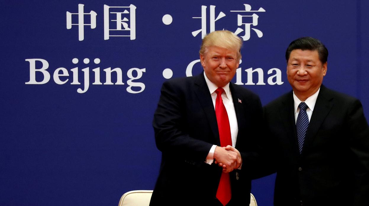 El presidente estadounidense, Donald Trump, junto a su homólogo chino, Xi Jinping