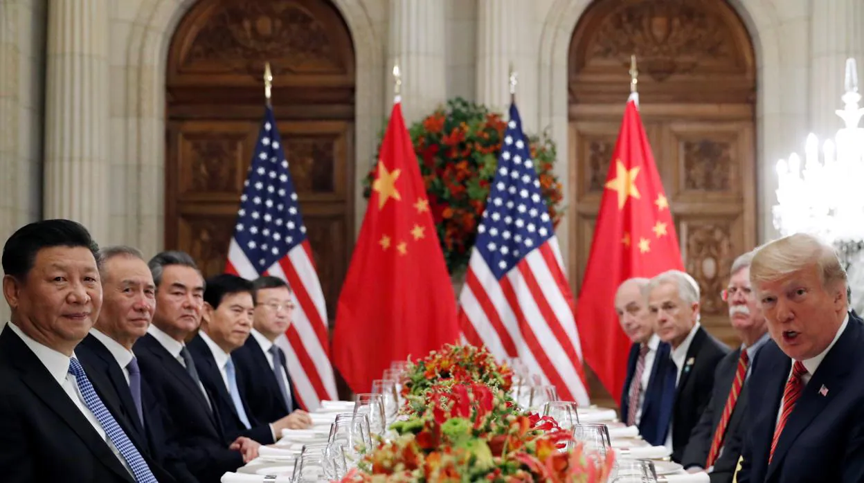 Donald Trump y Xi Jinping atienden a una cena de trabajo entre ambas delegaciones, en 2018