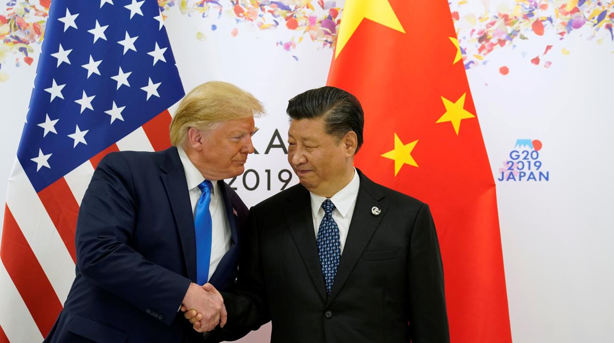 La guerra comercial entre Estados Unidos y China (en la imagen sus máximos dirigentes) entre las razones del parón en el comercio internacional