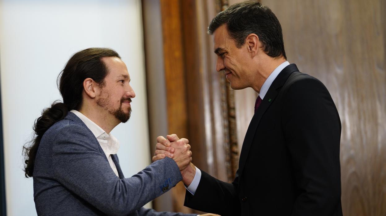 Firma del acuerdo de investidura de PSOE-Podemos