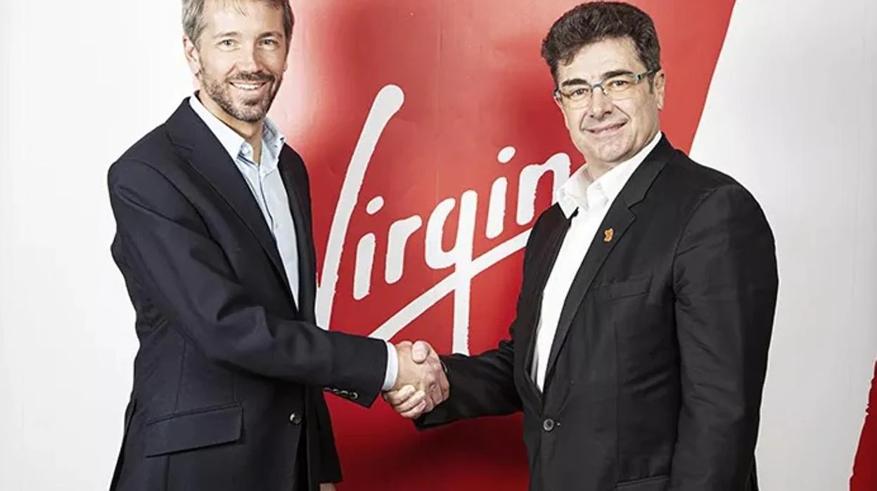 El consejero delegado de Virgin, Jhos Bayliss, y el de Euskaltel, José Miguel García