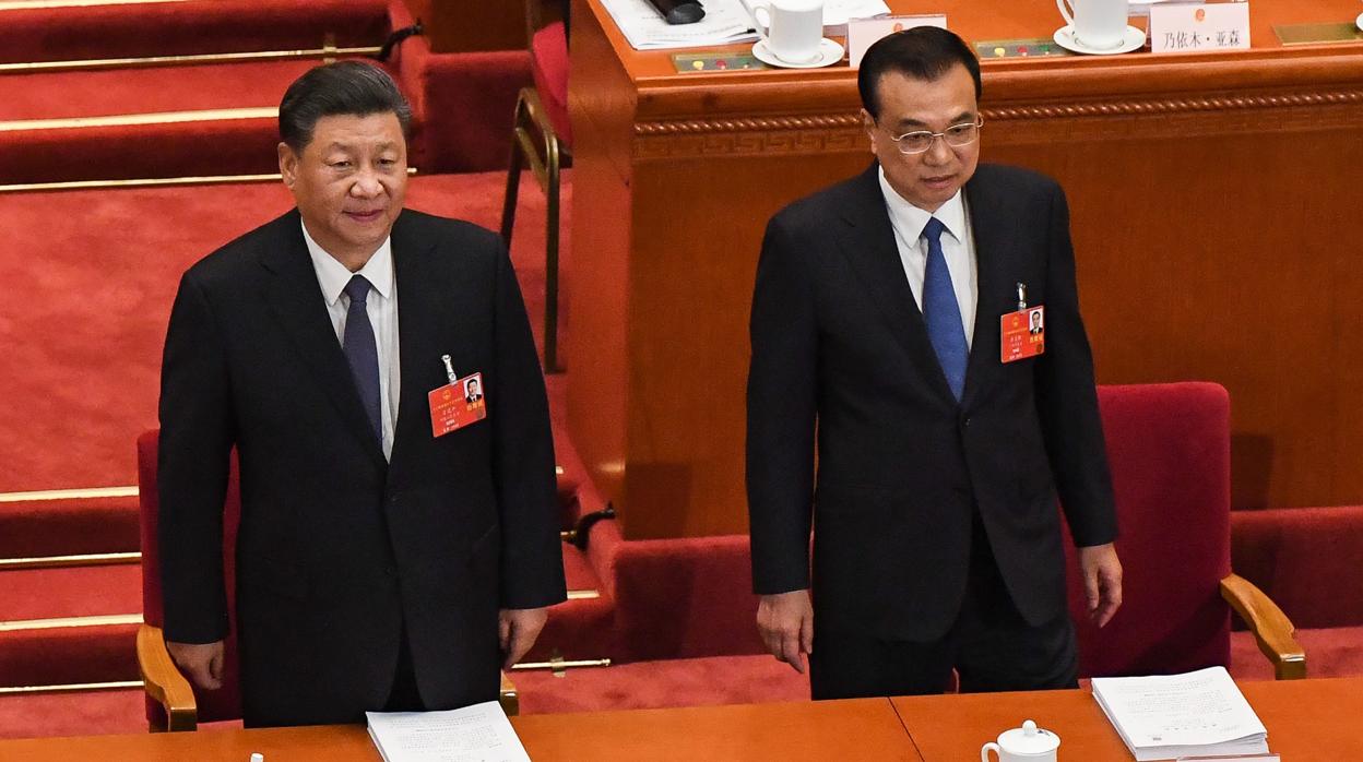 El presidente de China, Xi Jinping (I), y el primer ministro chino, Li Keqiang (D)